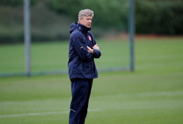 ST ALBANS, ENGLAND - NOVEMBER 23:  Arsene Wenger the Arsenal coach watches his players train during an Arsenal training session at London Colney on November 23, 2009 in St Albans, England.  (Photo by Shaun Botterill/Getty Images)