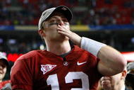 ATLANTA - DECEMBER 05:  Quarterback Greg McElroy #12 of the Alabama Crimson Tide celebrates after their 32-13 win over the Florida Gators in the SEC Championship at Georgia Dome on December 5, 2009 in Atlanta, Georgia.  (Photo by Kevin C. Cox/Getty Images)