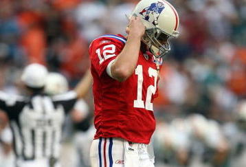 MIAMI - DECEMBER 06:  Quarterback Tom Brady #12 of the New England Patriots reacts after throwing an interception in the end-zone late in the fourth quarter against the Miami Dolphins at Land Shark Stadium on December 6, 2009 in Miami, Florida. The Dolphins defeated the Patriots 22-21.  (Photo by Doug Benc/Getty Images)