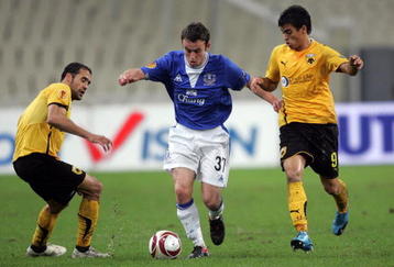 ATHENS, GREECE - DECEMBER 2: Geraldo (L) and Leonardo of AEK Athens compete with Seamus Coleman of Everton during the Europa League Match between AEK Athens and Everton at Spyros Louis Stadium, December 2, 2009 in Athens, Greece. (Photo by Milos Bicanski/Getty Images)