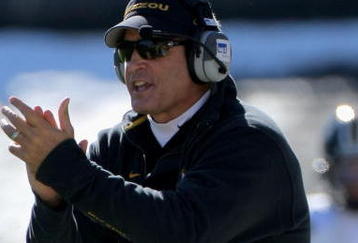 BOULDER, CO - OCTOBER 31:  Head coach Gary Pinkel of the Missouri Tigers leads his team against the Colorado Buffaloes at Folsom Field on October 31, 2009 in Boulder, Colorado.  (Photo by Doug Pensinger/Getty Images)
