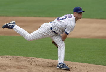CHICAGO - JULY 26: Rich Harden #40 of the Chicago Cubs delivers the pitch during the game against the Cincinnati Reds on July 26, 2009 at Wrigley Field in Chicago, Illinois. (Photo by Jonathan Daniel/Getty Images) 