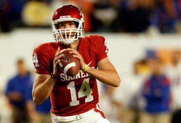 MIAMI - JANUARY 08:  Sam Bradford #14 of the Oklahoma Sooners look to pass against the Florida Gators during the FedEx BCS National Championship game at Dolphin Stadium on January 8, 2009 in Miami, Florida.  (Photo by Marc Serota/Getty Images)