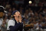 NEW YORK - SEPTEMBER 08:  Gregg Zaun #9 of the Tampa Bay Rays catches a pop up from Melky Cabrera #53 of the New York Yankees on September 8, 2009 at Yankee Stadium in the Bronx borough of New York City.  (Photo by Jim McIsaac/Getty Images)