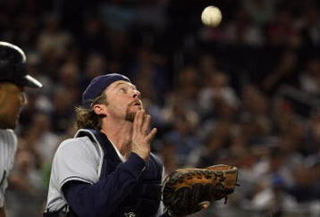 NEW YORK - SEPTEMBER 08:  Gregg Zaun #9 of the Tampa Bay Rays catches a pop up from Melky Cabrera #53 of the New York Yankees on September 8, 2009 at Yankee Stadium in the Bronx borough of New York City.  (Photo by Jim McIsaac/Getty Images)