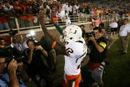 TALLAHASSEE, FL - SEPTEMBER 07:  Quarterback Jacory Harris #12 of the Miami Hurricanes celebrates victory over the Florida State Seminoles as he leaves the field at Doak Campbell Stadium on September 7, 2009 in Tallahassee, Florida. Miami defeated Florida State 38-34.  (Photo by Doug Benc/Getty Images)