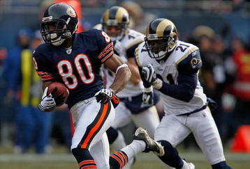 CHICAGO - DECEMBER 06:  Earl Bennett #80 of the Chicago Bears breaks for a long run and is chased by (L-R) Craig Dahl #43 and Oshiomogho Atogwe of the St. Louis Rams at Soldier Field on December 6, 2009 in Chicago, Illinois. The Bears defeated the Rams 17-9.  (Photo by Jonathan Daniel/Getty Images)
