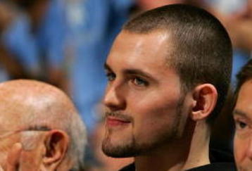 WESTWOOD, CA - MARCH 5:  Former UCLA Bruins basketball player Kevin Love applauds his former team during the NCAA basketball game between the Oregon State Beavers and the UCLA Bruins at Pauley Pavilion March 5, 2009 in Westwood, California. The Bruins defeated the Beavers 79-54. (Photo by Victor Decolongon/Getty Images)