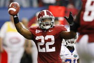 ATLANTA - DECEMBER 5:  Mark Ingram #22 of the Alabama Crimson Tide celebrates after he scored a 7-yard rushing touchdown in the first quarter against the Florida Gators during the SEC Championship game at Georgia Dome on December 5, 2009 in Atlanta, Georgia.  (Photo by Kevin C. Cox/Getty Images)