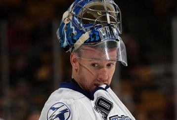 BOSTON - DECEMBER 02: Mike Smith #30 of the Tampa Bay Lightning pauses during warm-ups prior to his game against the Boston Bruins at the TD Garden on December 2, 2009 in Boston, Massachusetts. (Photo by Bruce Bennett/Getty Images)