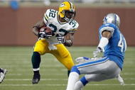 DETROIT , MI - NOVEMBER 26: Brandon Jackson #32 of the Green Bay Packers carries the ball against the Detroit Lions on November 26, 2009 at Ford Field in Detroit, Michigan. Green Bay won the game 34-12. (Photo by Gregory Shamus/Getty Images)