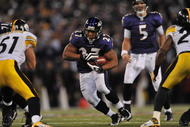 BALTIMORE - NOVEMBER 29:  Ray Rice #27 of the Baltimore Ravens runs the ball towards the center of the hashmarks in overtime to help set up the winning kick  against the Pittsburgh Steelers at M&T Bank Stadium on November 29, 2009 in Baltimore, Maryland. The Ravens defeated the Steelers 20-17. (Photo by Larry French/Getty Images)