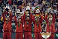 BARCELONA, SPAIN - DECEMBER 06:  Spanish players Feliciano Lopez (L), David Ferrer,  Fernando Verdasco (C) Rafael Nadal (2R) and team captain Albert Costa celebrate with the Davis Cup trophy at the end of the final match between Spain and Czech Republic at the Palau Sant Jordi stadium on December 6, 2009 in Barcelona, Spain.  (Photo by Denis Doyle/Getty Images)