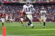 LANDOVER, MD - DECEMBER 06:  Robert Meachem #17 of the New Orleans Saints scores a touchdown against the Washington Redskins on December 6, 2009 at FedExField in Landover, Maryland.  (Photo by Chris McGrath/Getty Images)