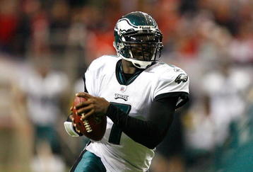 ATLANTA - DECEMBER 06:  Michael Vick #7 of the Philadelphia Eagles rushes upfield against the Atlanta Falcons at Georgia Dome on December 6, 2009 in Atlanta, Georgia.  (Photo by Kevin C. Cox/Getty Images)