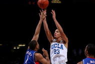 WESTWOOD, CA - DECEMBER 06:  Tyler Honeycutt  #23 of the UCLA Bruins shoots over Xavier Henry #1 of the Kansas Jayhawks on December 6, 2009 at Pauley Pavillion in Westwood, California.  Kansas won 73-61.  (Photo by Stephen Dunn/Getty Images)