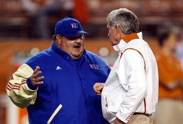 AUSTIN, TX - NOVEMBER 21:  Head coach Mark Mangino of the Kansas Jayhawks talks with Mack Brown of the Texas Longhorns at Darrell K Royal-Texas Memorial Stadium on November 21, 2009 in Austin, Texas.  (Photo by Ronald Martinez/Getty Images)