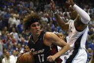 ORLANDO, FL - MAY 30:  Anderson Varejao #17 of the Cleveland Cavaliers handles the ball against Dwight Howard #12 of the Orlando Magic in Game Six of the Eastern Conference Finals during the 2009 Playoffs at Amway Arena on May 30, 2009 in Orlando, Florida. NOTE TO USER: User expressly acknowledges and agrees that, by downloading and or using this photograph, User is consenting to the terms and conditions of the Getty Images License Agreement  (Photo by Elsa/Getty Images)