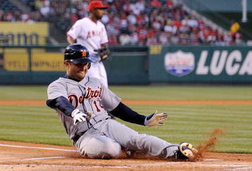ANAHEIM, CA - APRIL 22:   Placido Polanco #14 of the Detroit Tigers score a run on a one-run single by teammate Magglio Ordonez #24 against the Los Angeles Angels of Anaheim during the first inning of the baseball game at Angel Stadium on April 22, 2009 in Anaheim, California.  (Photo by Kevork Djansezian/Getty Images)