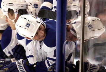 TORONTO - NOVEMBER 21:  Tomas Kaberle #15 of the Toronto Maple Leafs joins his team wearing their helmets backwards during the shoot-out against the Washington Capitals during game action November 21, 2009 at the Air Canada Centre in Toronto, Ontario, Canada. (Photo by Abelimages/Getty Images)