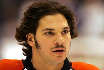 LOS ANGELES, CA - NOVEMBER 18:  Daniel Carcillo #13 of the Philadelphia Flyers skates during warm-up prior to their NHL game against the Los Angeles Kings at the Staples Center on November 18, 2009 in Los Angeles, California.  The Flyers defeated the Kings 3-2.  (Photo by Victor Decolongon/Getty Images)