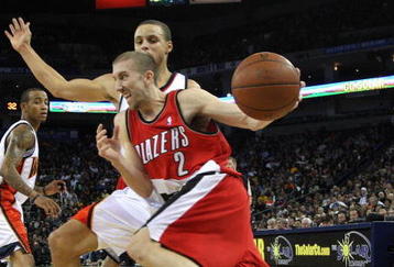 OAKLAND, CA - NOVEMBER 20:  Steve Blake #2 of the Portland Trail Blazers drives against Stephen Curry #30 of the Golden State Warriors during an NBA game at Oracle Arena on November 20, 2009 in Oakland, California.  (Photo by Jed Jacobsohn/Getty Images)