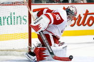 MONTREAL- SEPTEMBER 30: Jimmy Howard #35 of the Detroit Red Wings stops the puck during the game against the Montreal Canadiens at the Bell Centre on September 30, 2008 in Montreal, Quebec, Canada. The Canadiens defeated the Red Wings 2-1 in a shootout. (Photo by Richard Wolowicz/Getty Images)