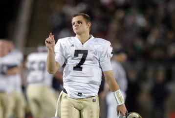 PALO ALTO, CA - NOVEMBER 28:  Jimmy Clausen #7 of the Notre Dame Fighting Irish walks the sidelines during their game against the Stanford Cardinal at Stanford Stadium on November 28, 2009 in Palo Alto, California.  (Photo by Ezra Shaw/Getty Images)