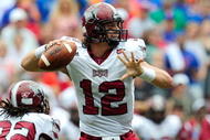 GAINESVILLE, FL - SEPTEMBER 12:  Levi Brown #12 of the Troy Trojans attempts a pass during the game against the Florida Gators at Ben Hill Griffin Stadium on September 12, 2009 in Gainesville, Florida.  (Photo by Sam Greenwood/Getty Images)