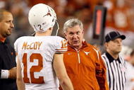 ARLINGTON, TX - DECEMBER 05:  Head coach Mack Brown of the Texas Longhorns talks with Colt McCoy #12 at Cowboys Stadium on December 5, 2009 in Arlington, Texas.  (Photo by Ronald Martinez/Getty Images)