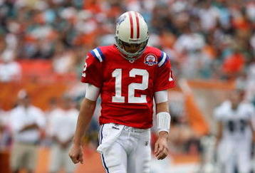 MIAMI - DECEMBER 06:  Quarterback Tom Brady #12 of the New England Patriots reacts after throwing an incomplete pass against the Miami Dolphins at Land Shark Stadium on December 6, 2009 in Miami, Florida. The Dolphins defeated the Patriots 22-21.  (Photo by Doug Benc/Getty Images)