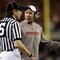 ARLINGTON, TX - DECEMBER 5:  Head coach Bo Pelini of the Nebraska Cornhuskers speaks to the referee during the first quarter of the game the Texas Longhorns at Cowboys Stadium on December 5, 2009 in Arlington, Texas.  (Photo by Jamie Squire/Getty Images)