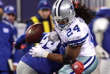 EAST RUTHERFORD, NJ - DECEMBER 06:  Marion Barber #24 of the Dallas Cowboys fumbles the ball as he is hit by Mathias Kiwanuka #94 of the New York Giants in the second quarter at Giants Stadium on December 6, 2009 in East Rutherford, New Jersey.  (Photo by Jim McIsaac/Getty Images)