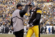 PITTSBURGH - DECEMBER 06: Ben Roethlisberger #7 of the Pittsburgh Steelers is congratulated by head coach Mike Tomlin after throwing a fourth quarter touchdown pass while playing the the Oakland Raiders December 6, 2009 at Heinz Field in Pittsburgh, Pennsylvania. Oakland won the game 27-24. (Photo by Gregory Shamus/Getty Images)