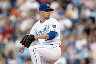KANSAS CITY - MAY 14: Gil Meche #55 of the Kansas City Royals lines up the pitch during the game between the Baltimore Orioles on May 14, 2009 at Kauffman Stadium in Kansas City, Missouri. (Photo by: Jamie Squire/Getty Images)