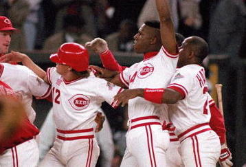 CINCINNATI - OCTOBER 17:  Eric Davis #44 of the Cincinnati Reds celebrates with teammates at the end of Game two of the 1990 World Series against the Oakland Athletics at Riverfront Stadium on October 17, 1990 in Cincinnati, Ohio. The Reds defeated the A's 5-4 in 10 innings. (Photo by Jonathan Daniel/Getty Images)