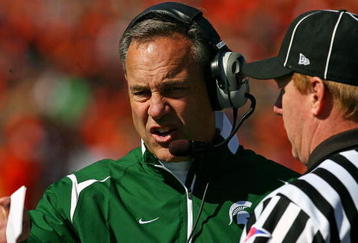 CHAMPAIGN, IL - OCTOBER 10: Head coach Mark Dantonio of the Michigan State Spartans argues with a referee during a game against the Illinois Fighting Illini on October 10, 2009 at Memorial Stadium at the University of Illinois in Champaign, Illinois. Michigan State defeated Illinois 24-14. (Photo by Jonathan Daniel/Getty Images)