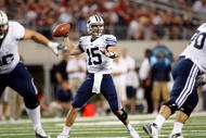 ARLINGTON, TX - SEPTEMBER 05:  Quarterback Max Hall #15 of the Brigham Young Cougars drops back to pass against the Oklahoma Sooners at Cowboys Stadium on September 5, 2009 in Arlington, Texas.  (Photo by Ronald Martinez/Getty Images)