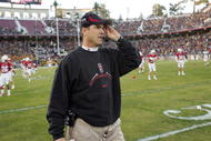 PALO ALTO, CA - NOVEMBER 21: Head Coach Jim Harbaugh of the Stanford Cardinal watches his team warmup before their game against the California Bears at Stanford Stadium on November 21, 2009 in Palo Alto, California. (Photo by Ezra Shaw/Getty Images)