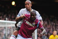 LONDON, ENGLAND - NOVEMBER 28:  Carlton Cole of West Ham holds off Clarke Carlisle of Burnley during the Barclays Premier League match between West Ham United and Burnley at Upton Park on November 28, 2009 in London, England.  (Photo by Mike Hewitt/Getty Images)