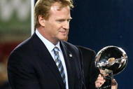 TAMPA, FL - FEBRUARY 01: NFL Commissioner Roger Goodell (L) present Dan Rooney, team owner of the Pittsburgh Steelers, with the Vince Lombardi trophy after the Steelers won 27-23 against the Arizona Cardinals during Super Bowl XLIII on February 1, 2009 at Raymond James Stadium in Tampa, Florida. (Photo by Al Bello/Getty Images)