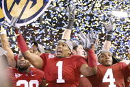 ATLANTA - DECEMBER 5:  B.J. Scott #1 of the Alabama Crimson Tide celebrates as confetti falls after their 32-13 win against the Florida Gators during the SEC Championship game at Georgia Dome on December 5, 2009 in Atlanta, Georgia.  (Photo by Kevin C. Cox/Getty Images)