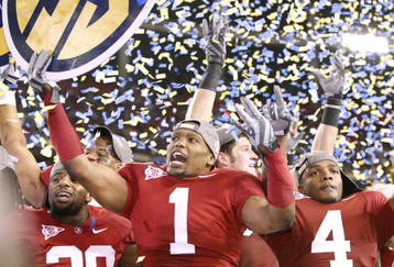 ATLANTA - DECEMBER 5:  B.J. Scott #1 of the Alabama Crimson Tide celebrates as confetti falls after their 32-13 win against the Florida Gators during the SEC Championship game at Georgia Dome on December 5, 2009 in Atlanta, Georgia.  (Photo by Kevin C. Cox/Getty Images)