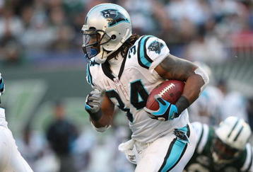 EAST RUTHERFORD, NJ - NOVEMBER 29:  DeAngelo Williams #34  of the Carolina Panthers rushes against the New York Jets at Giants Stadium on November 29, 2009 in East Rutherford, New Jersey.  (Photo by Nick Laham/Getty Images)