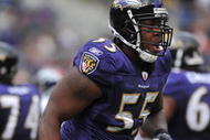 BALTIMORE - NOVEMBER 1:  Terrell Suggs #55 of the Baltimore Ravens comes up with the ball during the game against the Denver Broncos at M&T Bank Stadium on November 1, 2009 in Baltimore, Maryland. The Ravens defeated the Broncos 30-7. (Photo by Larry French/Getty Images)