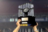 TAMPA, FL - NOVEMBER 28:  Coach Paul Johnson of the Georgia Tech Yellow Jackets holds the championship trophy aloft after play against the Clemson Tigers in the 2009 ACC Football Championship Game December 5, 2009 at Raymond James Stadium in Tampa, Florida.  (Photo by Al Messerschmidt/Getty Images)