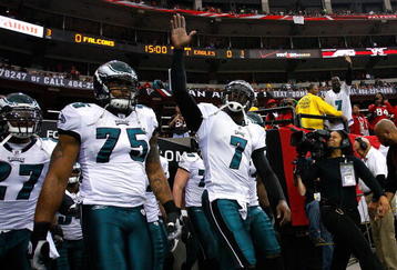 ATLANTA - DECEMBER 06:  Michael Vick #7 of the Philadelphia Eagles leads the team onto the field to face the Atlanta Falcons at Georgia Dome on December 6, 2009 in Atlanta, Georgia.  (Photo by Kevin C. Cox/Getty Images)