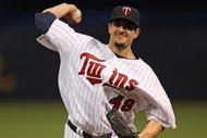 MINNEAPOLIS - OCTOBER 11: Carl Pavano #48 of the Minnesota Twins delivers the ball against the New York Yankees in Game Three of the ALDS during the 2009 MLB Playoffs at the Hubert H. Humphrey Metrodome on October 11, 2009 in Minneapolis, Minnesota. (Photo by Jonathan Daniel/Getty Images)