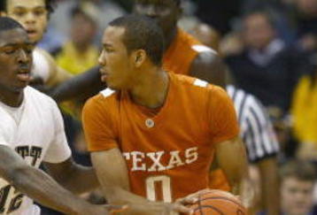 KANSAS CITY, MO - NOVEMBER 24:  Avery Bradley #0 of the Texas Longhorns looks to moves the ball against Ashton Gibbs #12 the Pittsburgh Panthers during the CBE Classic championship game on November 24, 2009 at Sprint Center in Kansas City, Missouri. (Photo by: Jamie Squire/Getty Images)