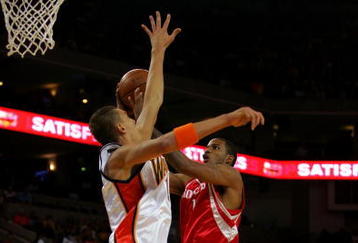 OAKLAND, CA - OCTOBER 28:  Trevor Ariza #1 of the Houston Rockets goes up for a shot while defended by Andris Biedrins #15 of the Golden State Warriors at Oracle Arena on October 28, 2009 in Oakland, California.  (Photo by Ezra Shaw/Getty Images)